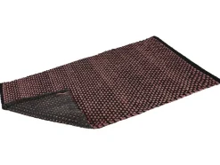 Alfombra de baño texturizada, con base antideslizante.
