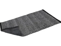 Alfombra de baño texturizada, con base antideslizante.