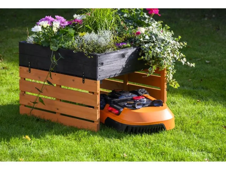 Garaje para cortacésped robotizable con jardinera