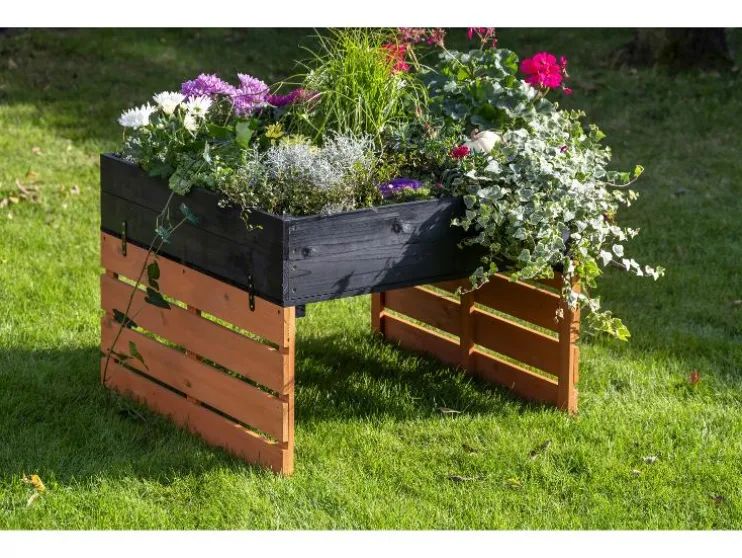 Garaje para cortacésped robotizable con jardinera