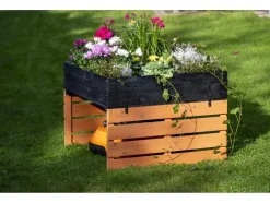 Garaje para cortacésped robotizable con jardinera