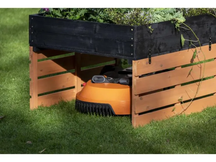 Garaje para cortacésped robotizable con jardinera
