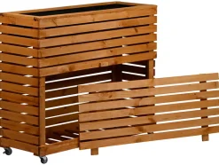 Huerto urbano »Rolla«, de madera de pino, con compartimento de almacenaje.