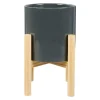 Maceta con soporte de cerámica esmaltada.