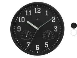 Reloj de pared con termómetro e higrómetro.