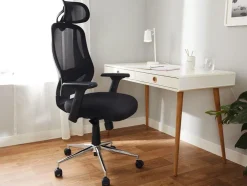Silla de oficina giratoria, con cabecero regulable.