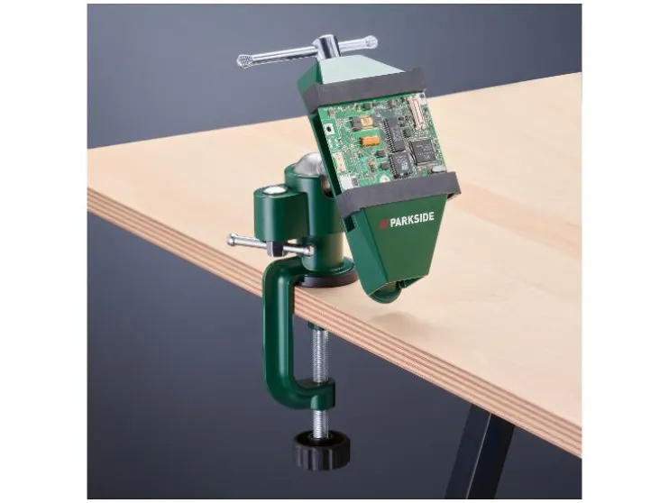 Tornillo de banco universal para mesa, con cabezal de herramienta intercambiable.