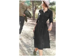 Vestido camisero de mujer, con aberturas laterales.