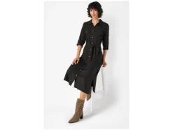 Vestido camisero de mujer, con aberturas laterales.