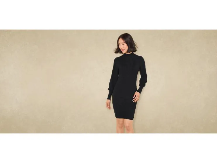 Vestido de punto de mujer, con mangas abullonadas largas.