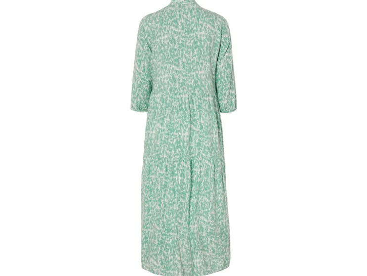 Vestido túnica de mujer con cordones decorativos.