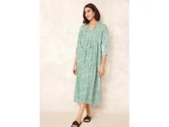 Vestido túnica de mujer con cordones decorativos.